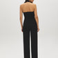 Black Halter Neck Knit Jumpsuit - Woman Wearing Elegant One-Piece with Self-Belt - Suzy Shier
