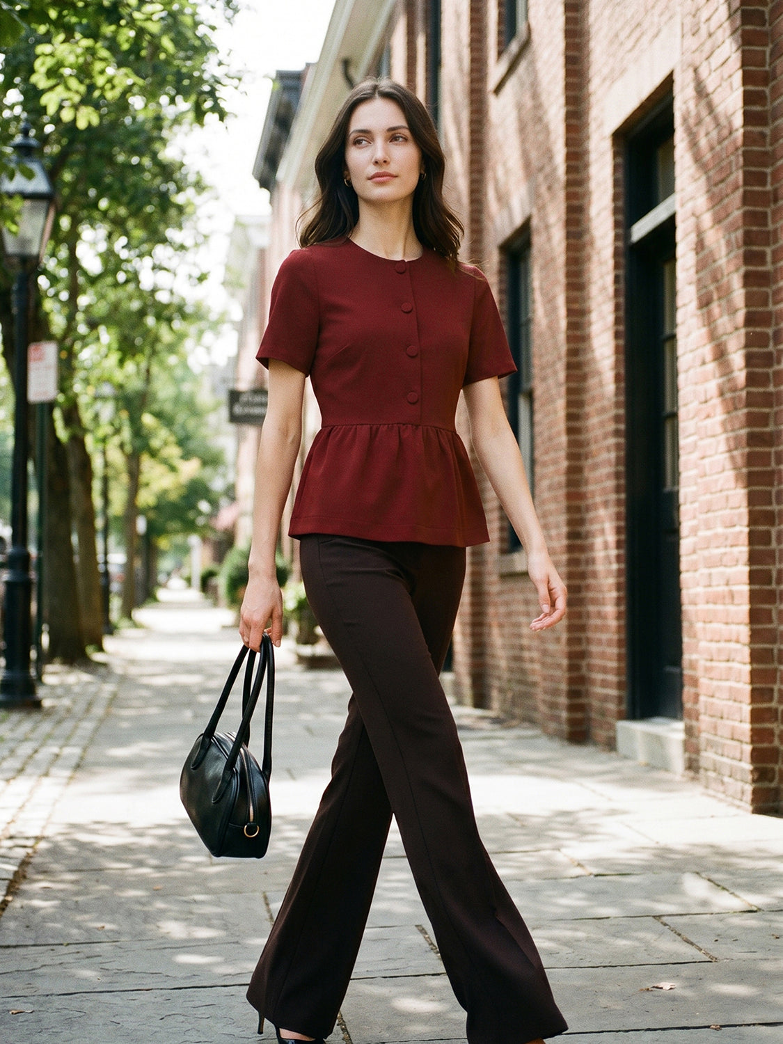 Syrah Button Front Peplum Crepe Top - Woman Wearing Short Sleeve Knit Top - Suzy Shier