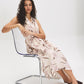 Pink Tint Dot Print Satin Halter Dress - Seated View - Suzy Shier