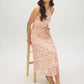 Peach Dust Floral Print Halter Midi Dress - Seated View - Suzy Shier