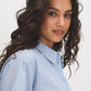 Forever Blue Striped Drop Shoulder Blouse - Woman Wearing Button-Front Shirt with Roll-Up Sleeves - Suzy Shier