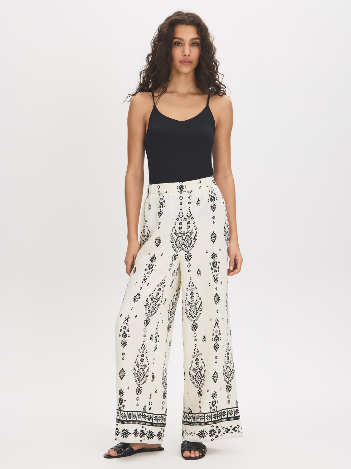 White Wide-Leg Viscose Pants with Black Border Print - Woman Wearing Casual Pull-On Pants - Suzy Shier