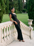 Black One-Shoulder Jumpsuit with Chiffon Ruffle Detail - Woman Wearing Wide-Leg Evening Jumpsuit - Le Chateau