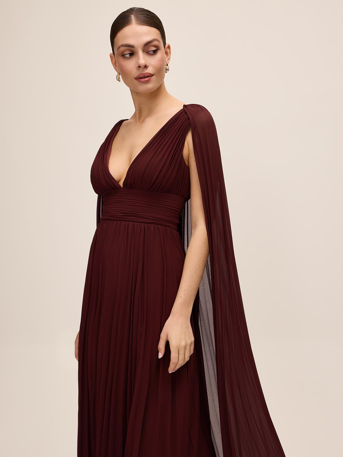 Bordeaux V-Neck Pleated Chiffon Gown - Side Profile with Cape - Le Chateau