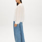 Winter White Swiss Dot Blouse with Peplum Hem - Side Profile View - Suzy Shier