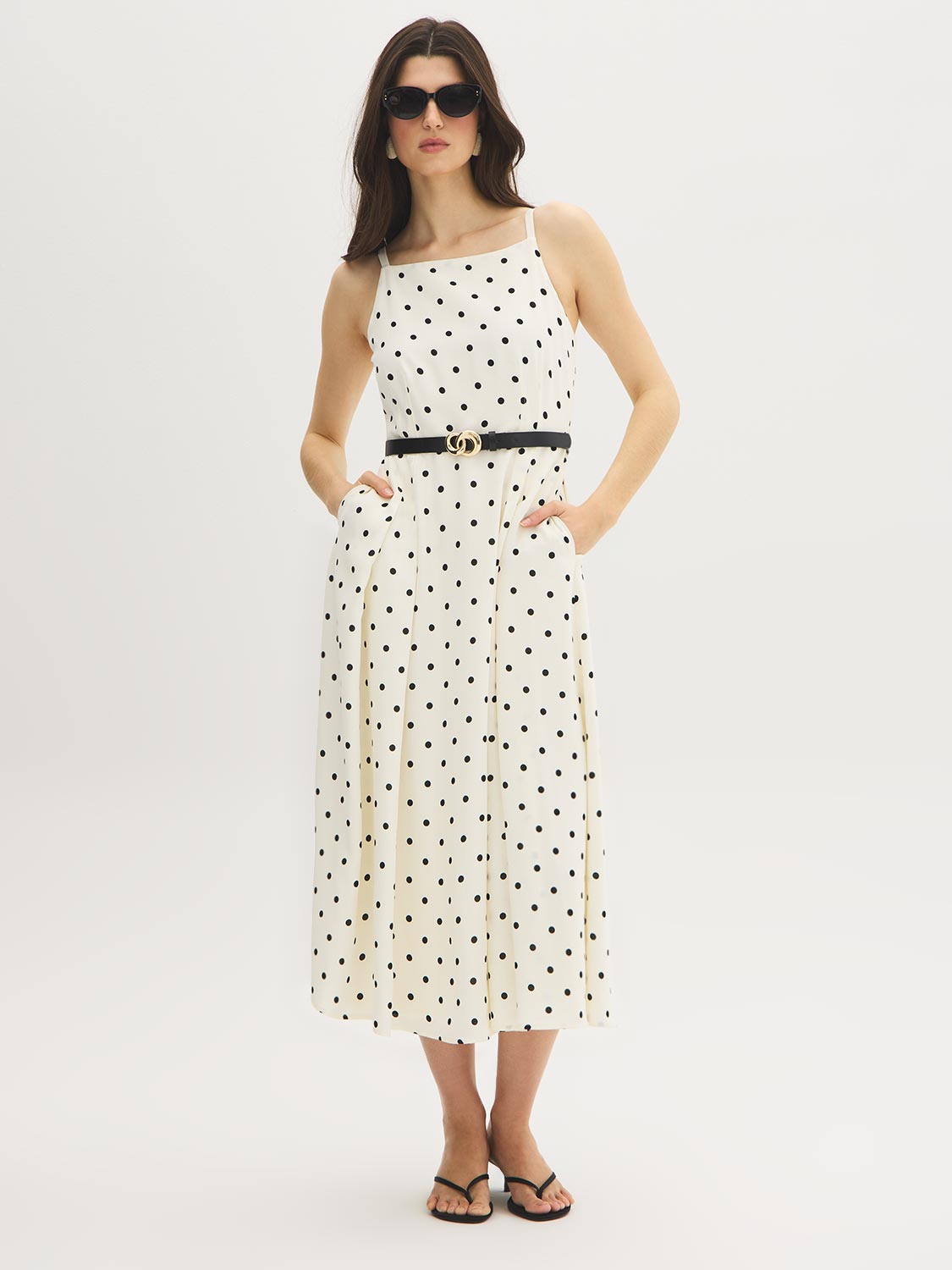 Snow White Polka Dot Flowy Midi Dress - Woman Wearing Spaghetti Strap Dress with Belt - Suzy Shier