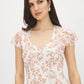 Warm White Floral Print Chiffon Midi Dress - Close-up Front Detail - Suzy Shier