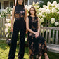 Jet Black Floral Print Mesh Funnel Neck Top - Woman Wearing Sleeveless Ruched Top - Suzy Shier