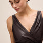 Espresso Crossover Pleated Faux Leather Dress - Close-up Fabric Detail - Le Chateau