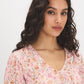 Peach Dust Floral Crinkle V-Neck Top - Front View - Suzy Shier