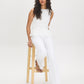 Snow White Textured Knit Peplum Top - Woman Wearing Sleeveless Boat Neck Blouse - Suzy Shier