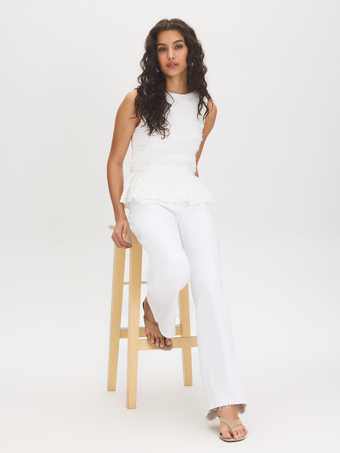 Snow White Textured Knit Peplum Top - Woman Wearing Sleeveless Boat Neck Blouse - Suzy Shier