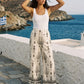 White Wide-Leg Viscose Pants with Black Border Print - Woman Wearing Casual Pull-On Pants - Suzy Shier