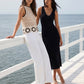 Black Crochet-Like Fitted Midi Dress - Woman Wearing Knit Dress with V-Front and Wide Straps - Suzy Shier