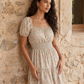 Sterling Blue Ditsy Print Off-Shoulder Mini Dress - Woman Wearing Tiered Skirt Dress - Suzy Shier