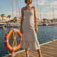 Snow White Black Stripe Empire Waist Midi Dress - Woman Wearing Striped Dress with Ruffle Hem - Suzy Shier