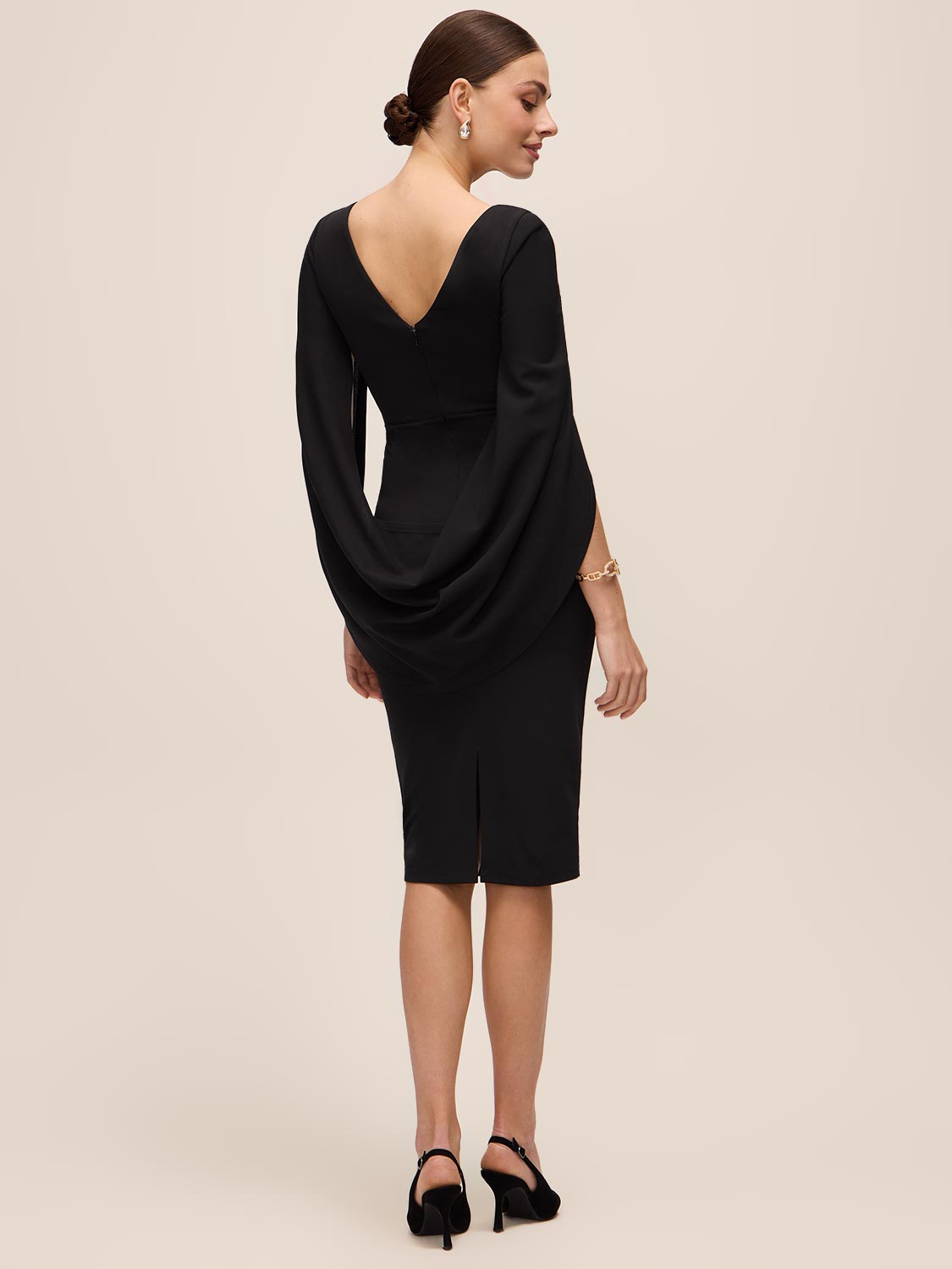 Black Boat Neck Sheath Dress with Back Cape - Back View - Le Chateau