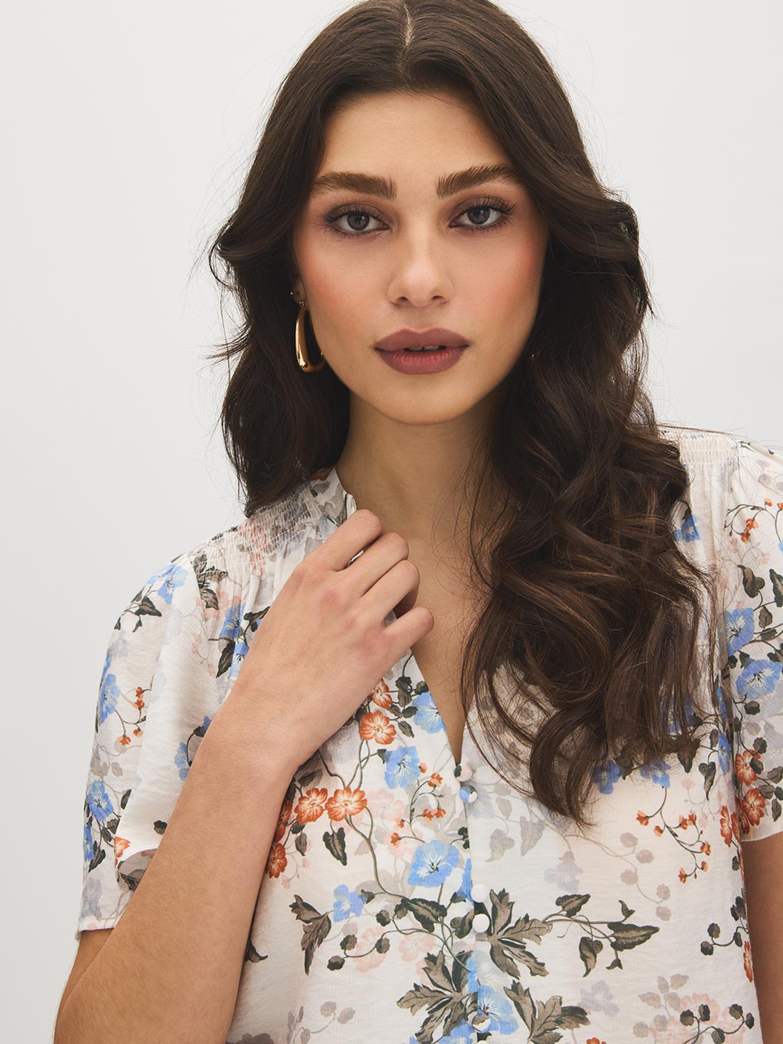 Winter White Floral Print Blouse with Smocked Shoulders - Close-up Fabric Detail - Suzy Shier