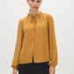 Wood Trush Swiss Dot Blouse with Peplum Hem - Woman Wearing Textured Long Sleeve Top - Suzy Shier