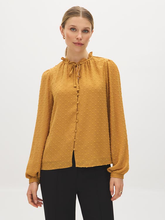 Wood Trush Swiss Dot Blouse with Peplum Hem - Woman Wearing Textured Long Sleeve Top - Suzy Shier