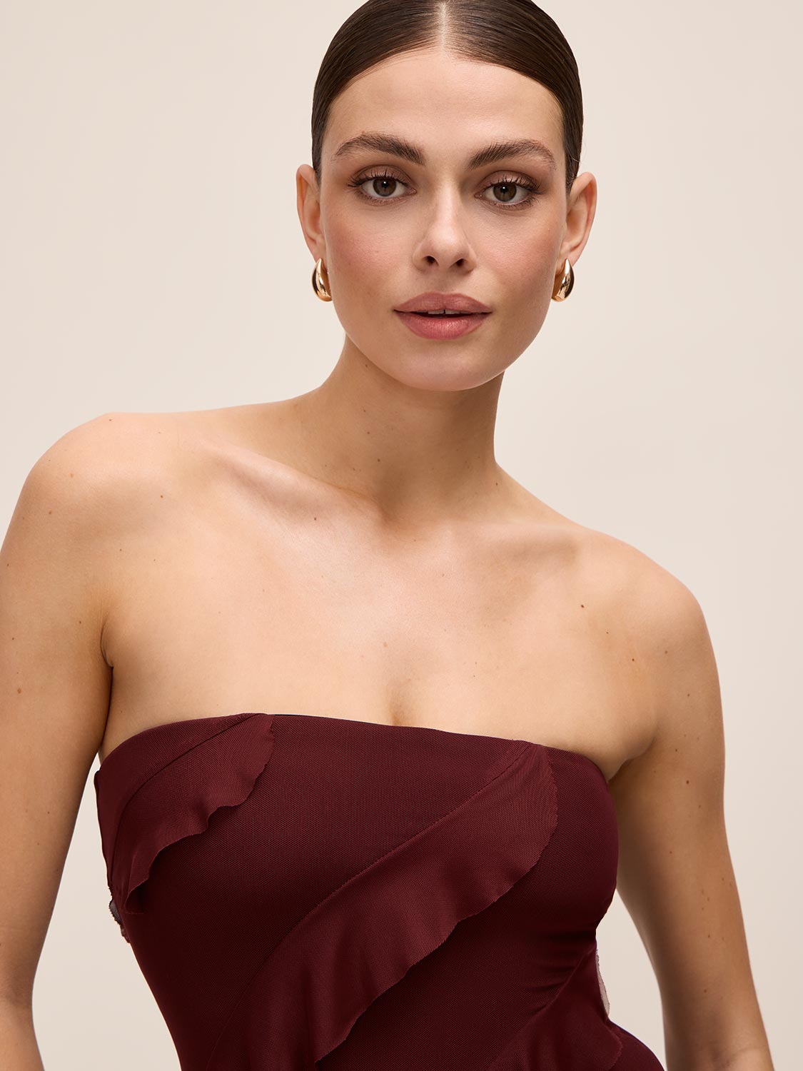 Bordeaux Strapless Mesh Midi Dress with Asymmetrical Ruffles - Close-up Bodice Detail - Le Chateau