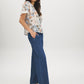 Winter White Floral Print Blouse with Smocked Shoulders - Woman Wearing Button-Front Top - Suzy Shier