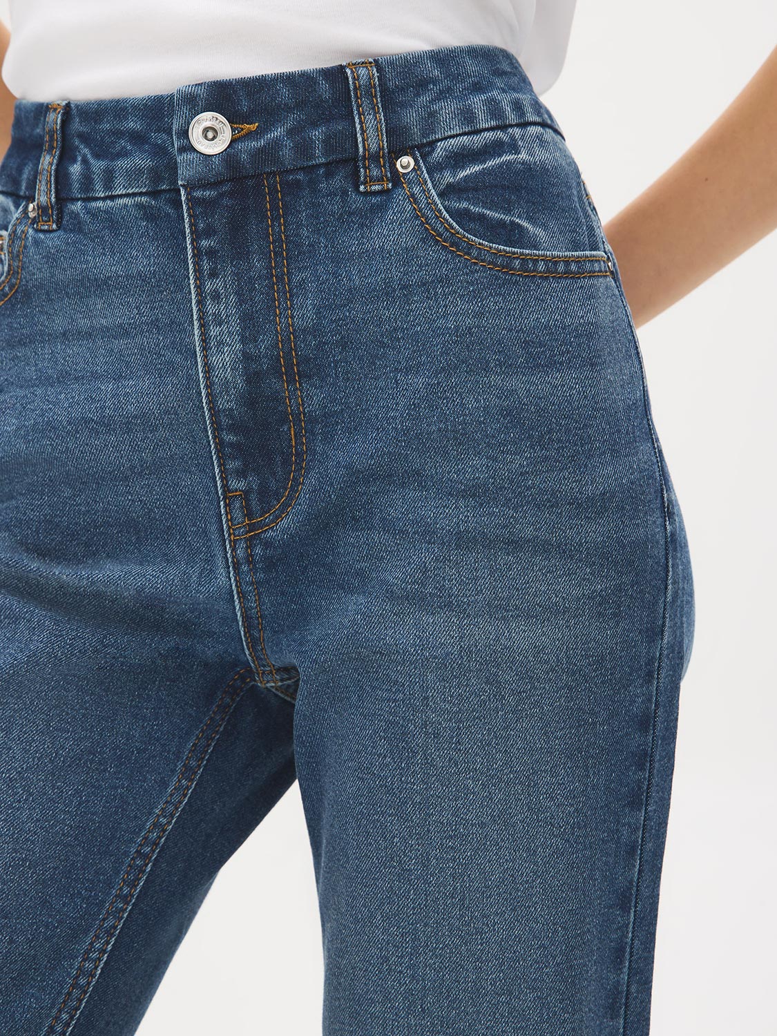 Medium Wash Basic Straight Leg Denim Pant - Close-up Fabric Detail - Suzy Shier
