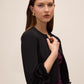 Black Knit Crepe Cover Up with Chiffon Cuff - Front View - Le Chateau