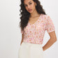 Peach Dust Floral Crinkle V-Neck Top - Woman Wearing Bubble Sleeve Blouse - Suzy Shier