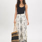 White Wide-Leg Viscose Pants with Black Border Print - Woman Wearing Casual Pull-On Pants - Suzy Shier