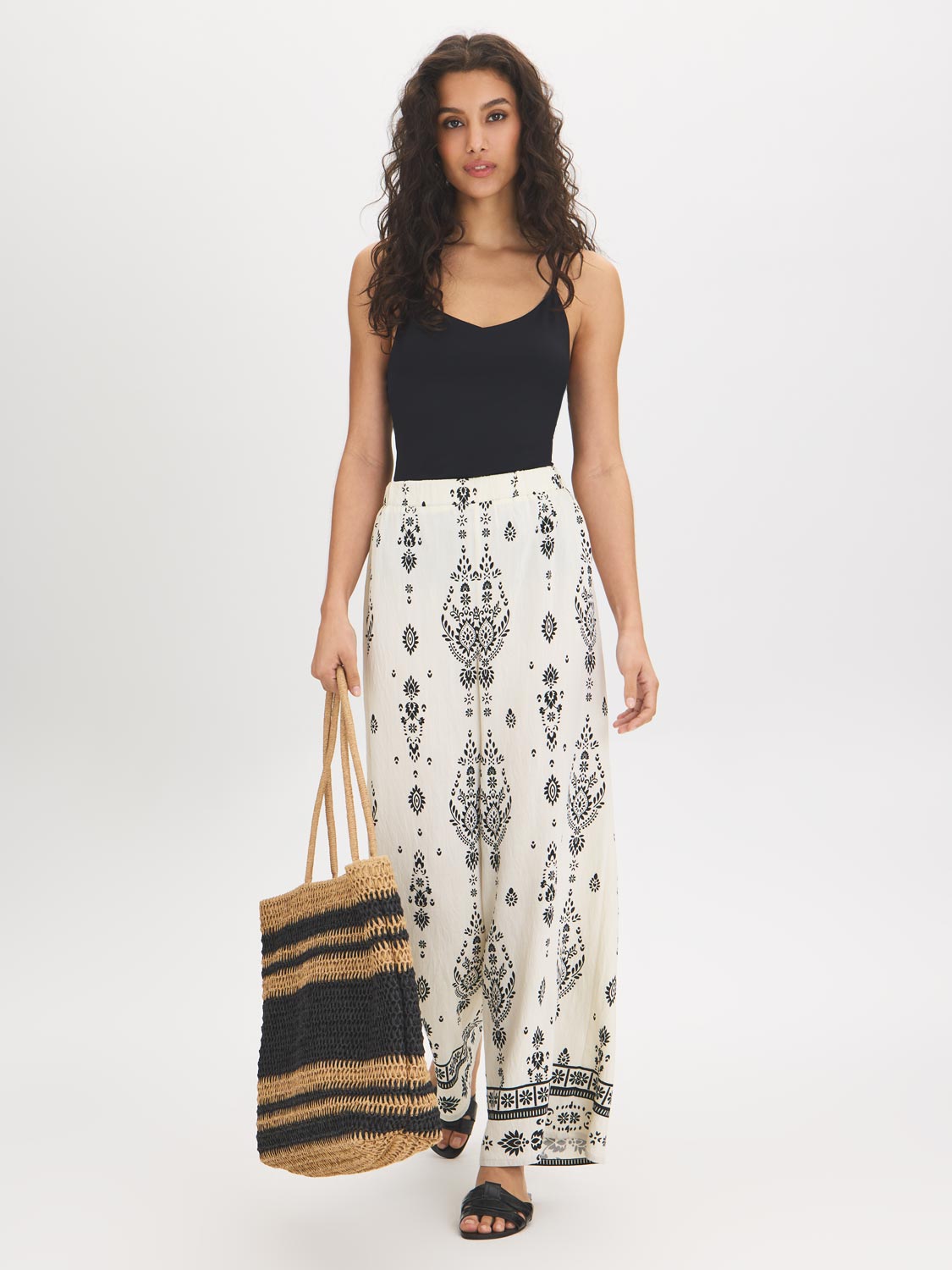White Wide-Leg Viscose Pants with Black Border Print - Woman Wearing Casual Pull-On Pants - Suzy Shier