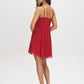 Jester Red Polka Dot Chiffon Mini Dress - Woman Wearing V-Neck Mini Dress with Adjustable Straps - Suzy Shier