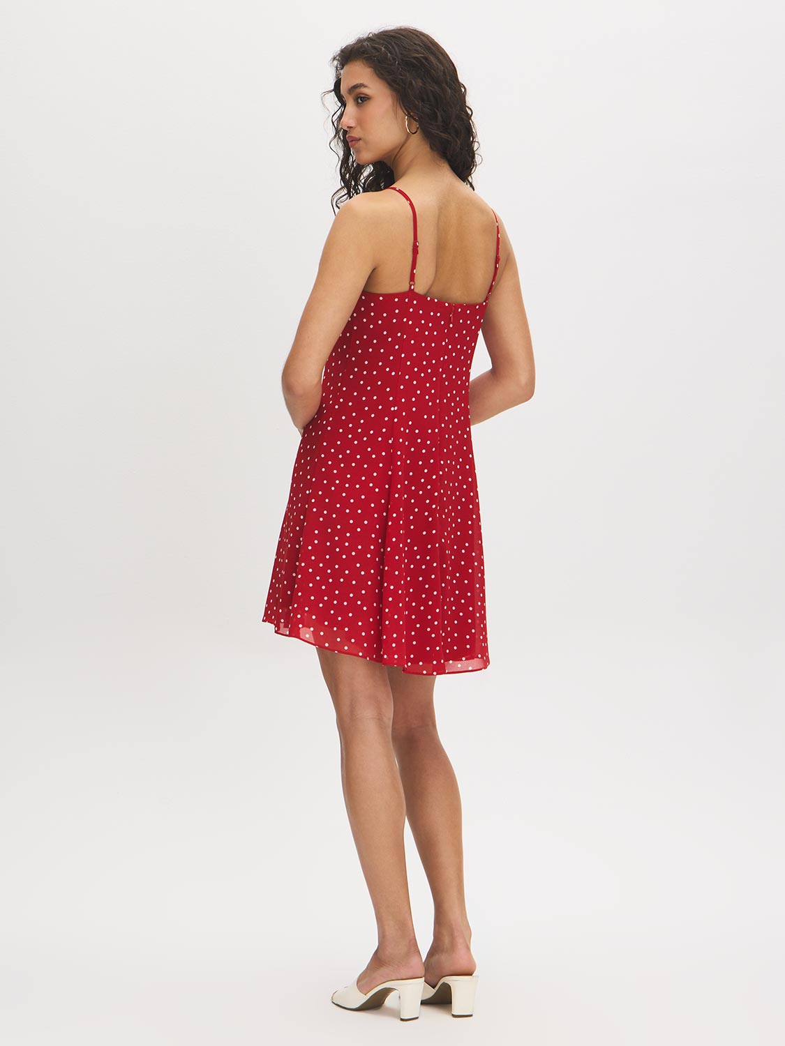 Jester Red Polka Dot Chiffon Mini Dress - Woman Wearing V-Neck Mini Dress with Adjustable Straps - Suzy Shier