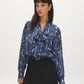 Oceana Printed Pussy Bow Blouse - Woman Wearing V-Neck Long Sleeve Top - Suzy Shier