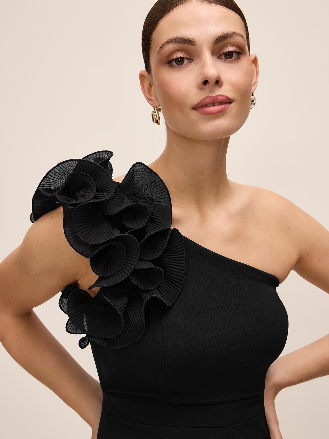 Black One-Shoulder Jumpsuit with Chiffon Ruffle Detail - Close-up Ruffle Detail - Le Chateau