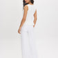 Snow White Textured Knit Peplum Top - Woman Wearing Sleeveless Boat Neck Blouse - Suzy Shier