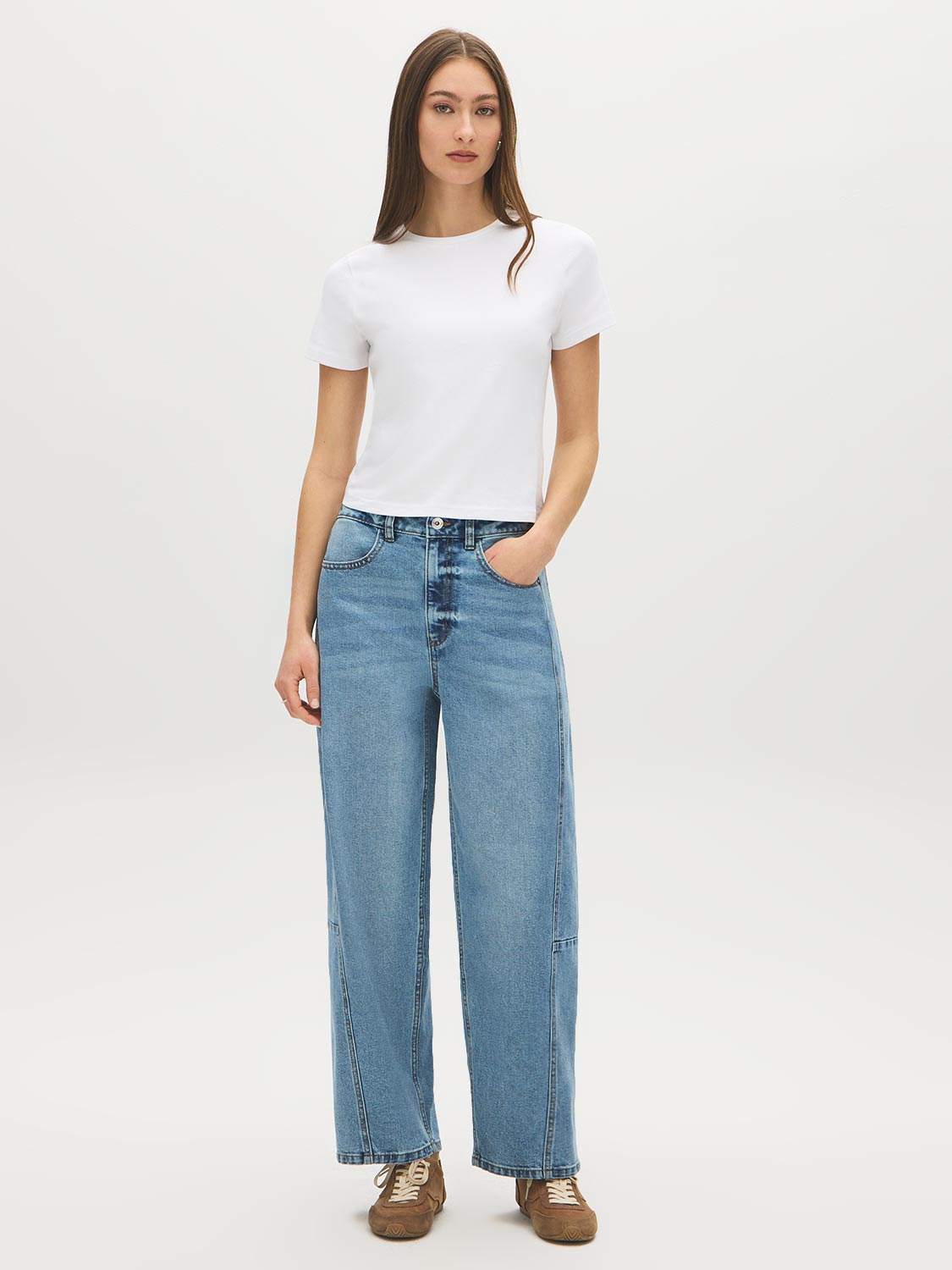 Medium Stone Wash Curved Wide-Leg Denim Pant - Woman Wearing Wide-Leg Jeans with Side Panels - Suzy Shier