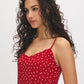 Jester Red Polka Dot Chiffon Mini Dress - Woman Wearing V-Neck Mini Dress with Adjustable Straps - Suzy Shier